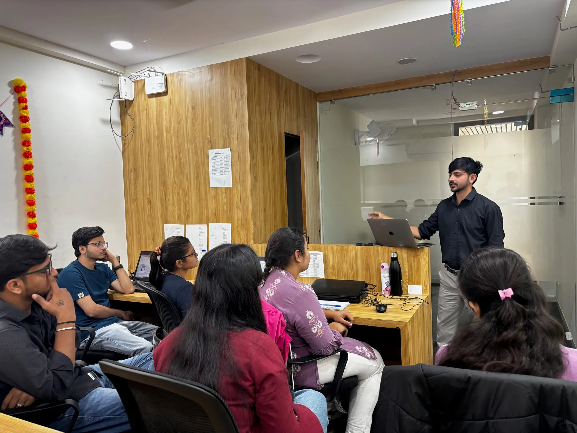 Mukesh Chaudhary presenting a marketing session to a group